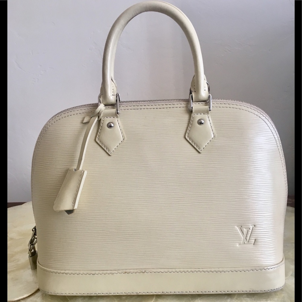 Louis Vuitton Alma PM Leather Bag